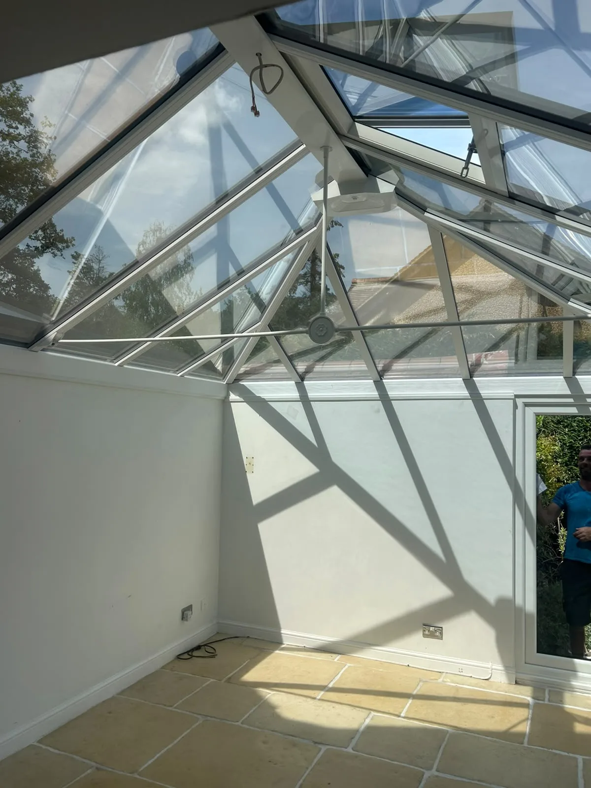 Corner view of the conservatory with the roof vents open